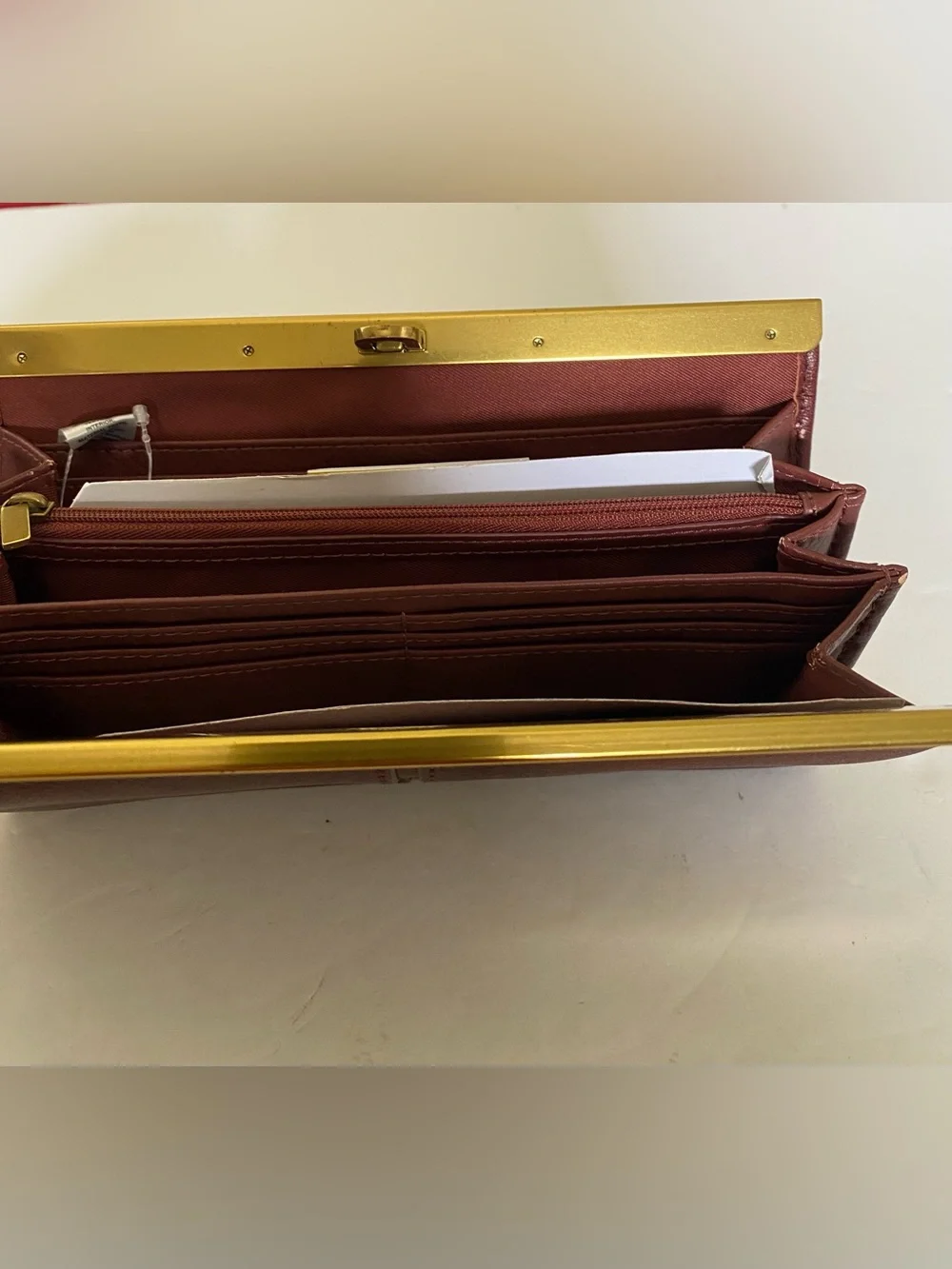 Fossil Burgundy Red Brown Sleek Leather Clutch Wallet with Gold Accent NEW